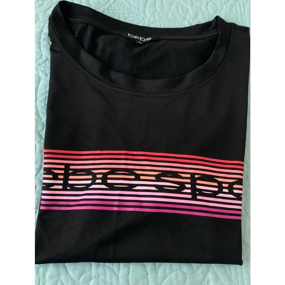 BEBE SPORT SHORT WAISTED TOP, WOMENS. XL, BLACK W/COLORFUL STRIPES ON FRONT - Picture 5 of 9